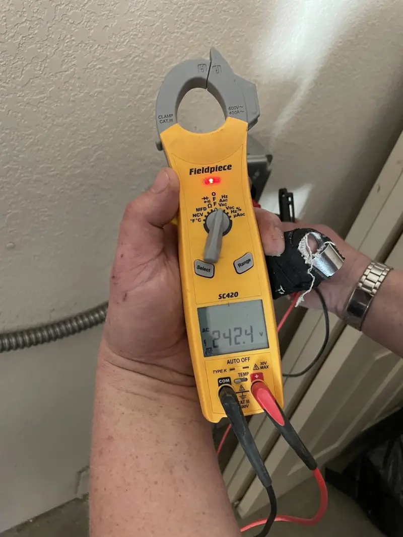 Voltage testing with clamp meter during Hot Tub / Pool Electrical Wiring in New Lexington